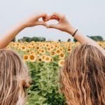 2 friends in a field - Best long distance friendship gifts