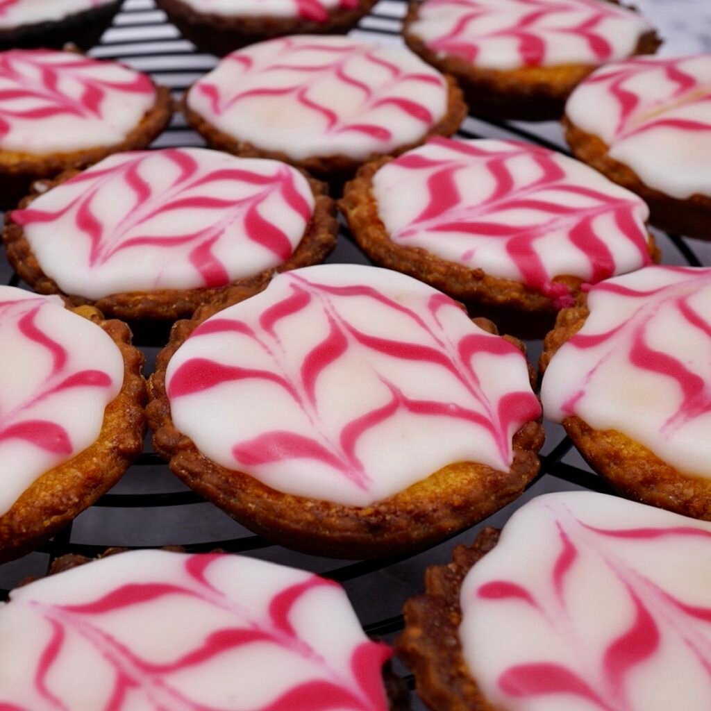 Mini iced Bakewell tarts