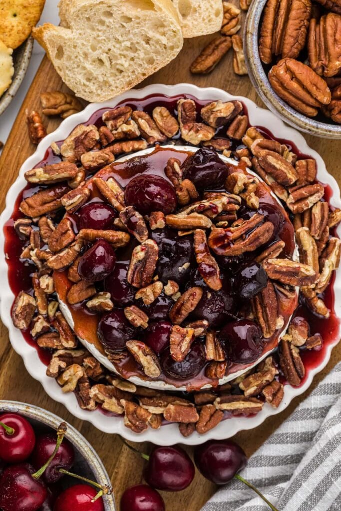 Baked Brie with Pecans and Cherry Sauce
